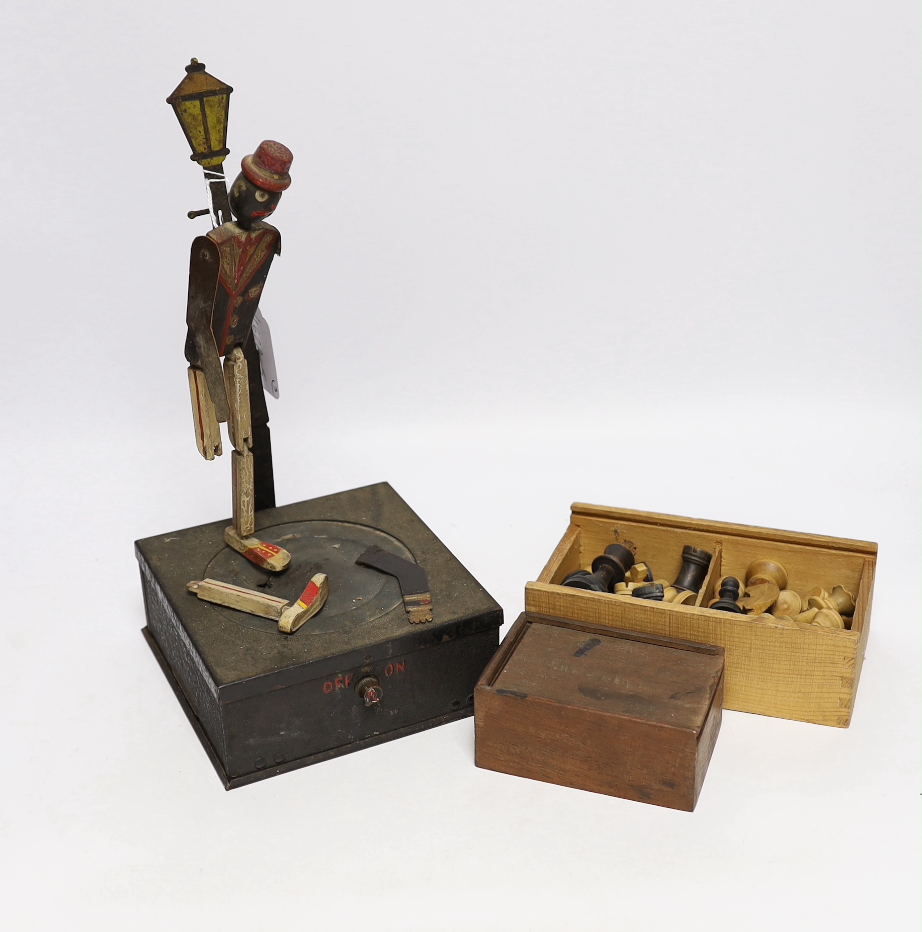 Two turned wood chess sets and a dancing toy